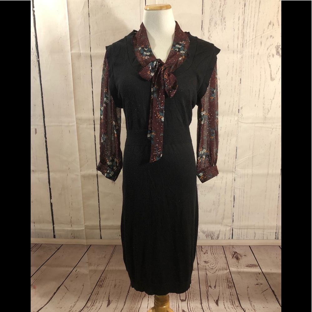 Black dress with faux blouse.